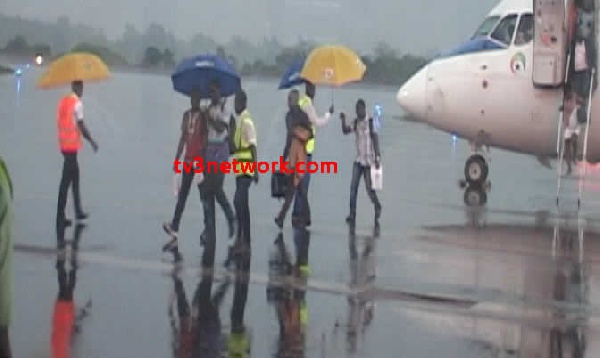 Passengers who disembarked had to walk about 100 metres in the rain to get to the arrival hall