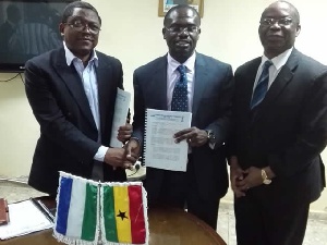 Director of NATCOM Kallon signed the contract with Chairman of Jospong Group, Dr Joseph Agyepong