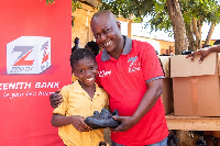 A Zenith Bank official with a beneficiary