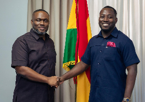 Theophilus Berchie (R) with the Minister of Transport