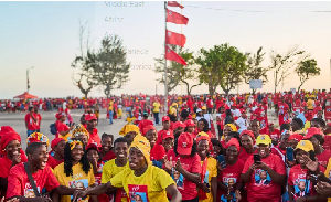 Supporters of Mozambique Liberation Front (Frelimo) party chant slogans during a rally in Beira