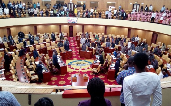 The legislators observe a minute of silence in memory of the late Mary Grant