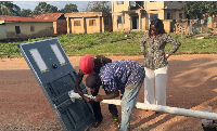 Gloria Opoku Gyamfi, Wenchi Municipal Chief Executive looks on during installation