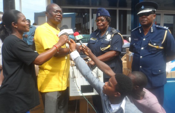 ACP Agnes Maclean (2nd right) receiving the items from Samuel Sackey on behalf of the Hospital