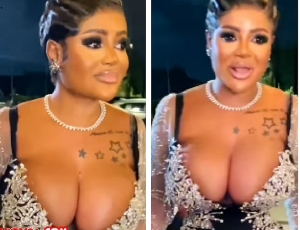 Aba Dope was captured 'turned heads' by showcasing her breasts at the event