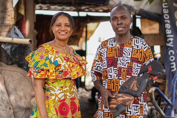 Elizabeth Attoh, Country Manager of NOVICA Ghana, with an artisan