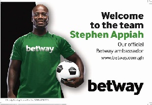 Stephen Appiah in a branded  Betway shirt