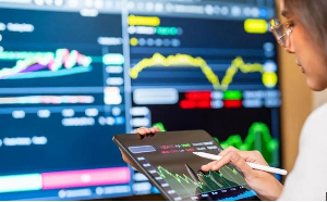 FTSE 100 index climbs above 10,000 points for the first time