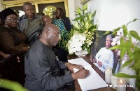 Vice President Dr Mahamudu Bawumia signs the book of condolence