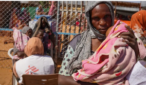 A woman and baby at the Zamzam displacement camp, close to El Fasher in North Darfur, Sudan