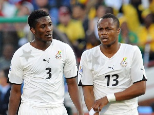 Asamoah Gyan and Dede Ayew