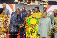 Otumfuo with the Minister of Lands and Natural Resources, Samuel Abu Jinapor