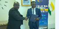 CEO of PHDC, Dr Aubynn, (L) in a handshake with CEO of Mannschaft Engineering, Maxwell Adu