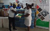 Senior Nursing officer Josephine Owusu-Takyi (R) received the items on behalf of the hospital