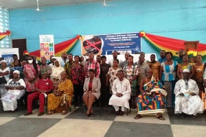 Participants pose for a photo after the meeting