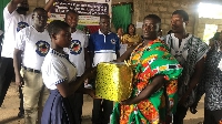 A student receiving her award