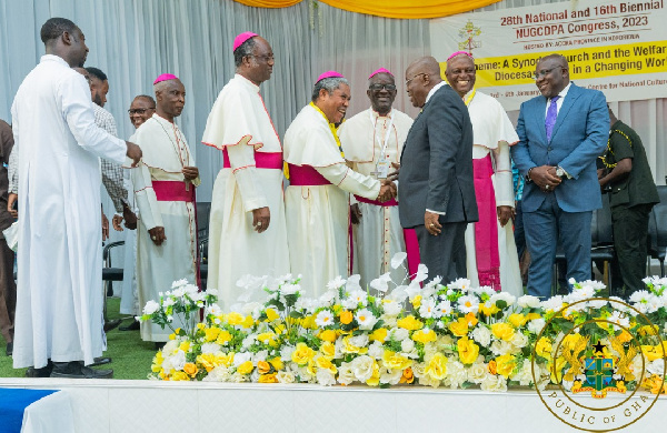 President of Ghana, Nana Addo Dankwa Akufo-Addo, with some clergymen