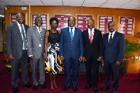 Governor of the BoG, Dr. Ernest Addison in a group photo with the delegation from Access bank