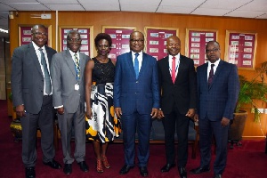 Governor of the BoG, Dr. Ernest Addison in a group photo with the delegation from Access bank