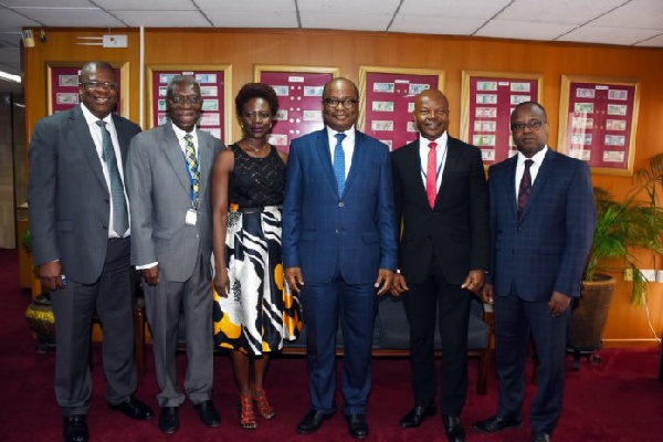 Governor of the BoG, Dr. Ernest Addison in a group photo with the delegation from Access bank