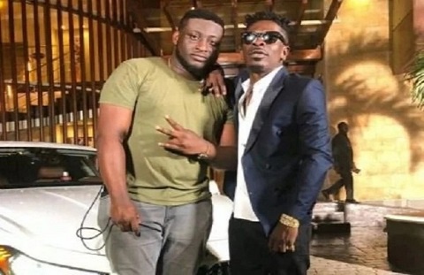 Dancehall artiste, Shatta Wale with his manager, Julio Cyriaano