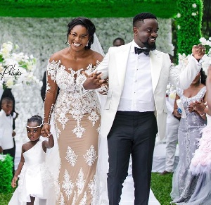 Rapper Sarkodie with wife Tracy Sarkcess and baby