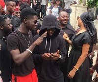 Kuami Eugene wore what looked like a faded black t-shirt to Ebony's one-week memorial