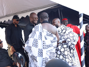 Kennedy Agyapong shaking hands with the former MP Alfred Obeng Boateng during his mother's funeral