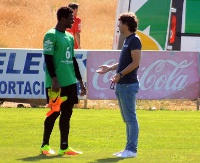 Razak Brimah and Cordoba sporting director Emilio Vega on the training ground
