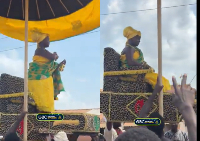 Queen Mother of Awukugua-Akuapem, sits on a traditional palanquin during the Ohum Festival