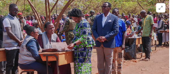 Malawian President Lazarus Chakwera waits to vote in the country's general election at Malembo villa