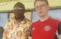 John Christensen in a pose with Dr. Kwaku Frimpong, one of the new owners of Ashantigold FC