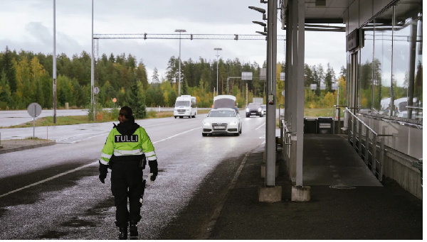 A customs official is seen in Vaalimaa, Finland, on the border with Russia, in September 2022.