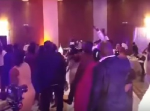 Guests at a wedding reception dancing to 'Onaapo'