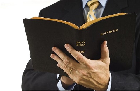 File photo; A man of God holding the Bible