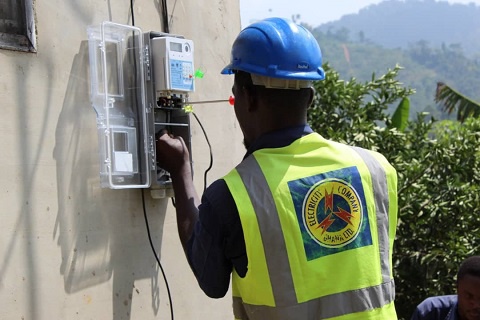 ECG staff working on a meter