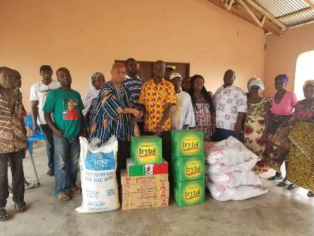 The items include bags of rice, sugar, cooking oil, canned fish and tomatoes