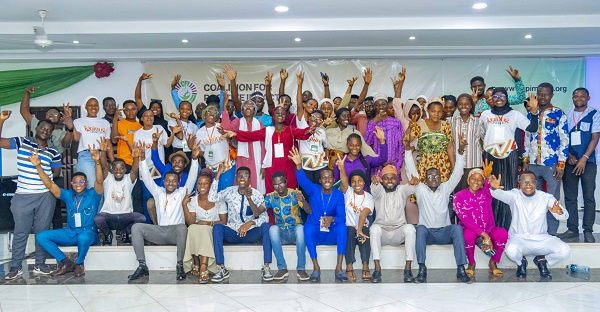 A group picture of some youth after the summit