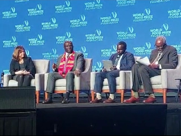 Eric Opoku (second from R) speaking at the event