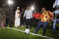 President Akufo-Addo gives the first kick in the newly commissioned stadium