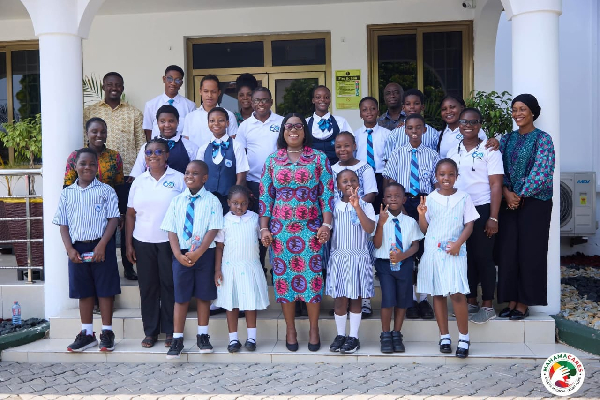 The school children with Obuobia Darko-Opoku during their visit