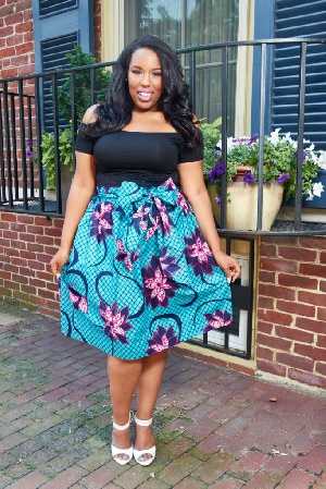 A plus size lady styled in an Ankara skirt