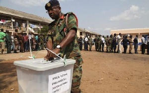 A military man voting during a special voting exercise