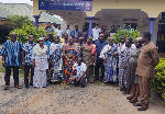 Members of the council in a group picture with staff of Dzodze Ghana Mission Hospital