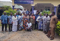 Members of the council in a group picture with staff of Dzodze Ghana Mission Hospital