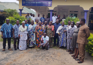 Members of the council in a group picture with staff of Dzodze Ghana Mission Hospital