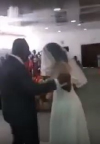 Angry 'side chick' resisting a man trying to prevent her from going to the altar