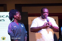 Isaac Asiamah with Black Queens captain