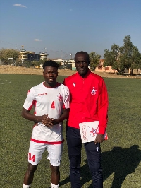 Coach Prince Koffie with one of the players
