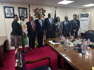 The AERC delegation and BoG Governor, Dr Ernest Addison in a photograph